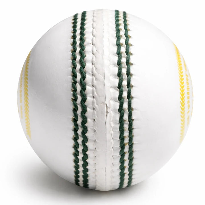 Close view of the green and white hand-stitched seam on a Khelspace Prime white leather cricket ball